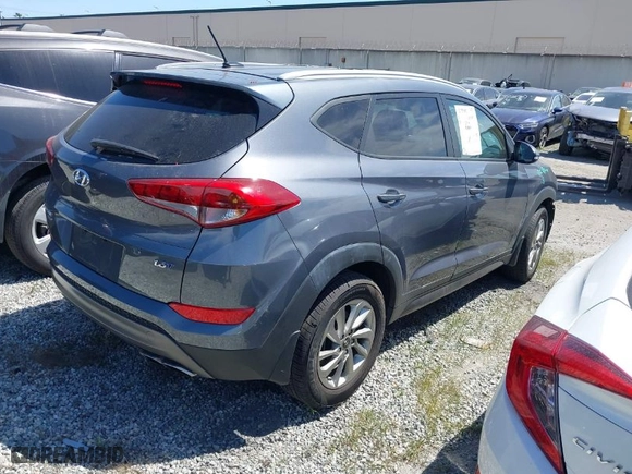 2016 Hyundai Tucson Limited with VIN KM8J33A24GU124543, listed as a IAAI auction lot 41808327 with 38,069 mi miles. Bid and sale history available at carsss.com. Image 4.