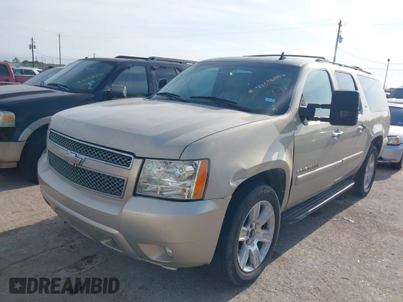 2008 Chevrolet Suburban LTZ with VIN 1GNFC16038R278002, listed as a IAAI auction lot 42036356 with 257,597 mi miles and . Bid and sale history available at DreamBid. Image 2.