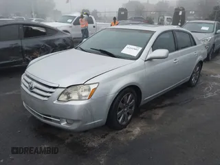 2007 Toyota Avalon XL with VIN 4T1BK36B17U226740, listed as a IAAI auction lot 41191802 with 173,314 mi miles and . Bid and sale history available at DreamBid. Image 2.