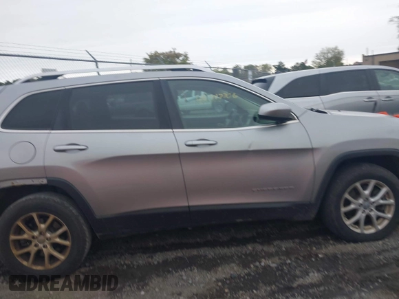 2014 Jeep Cherokee Latitude with VIN 1C4PJMCS5EW198112, listed as a IAAI auction lot 40417706 with 169,921 mi miles. Bid and sale history available at carsss.com. Image 14.