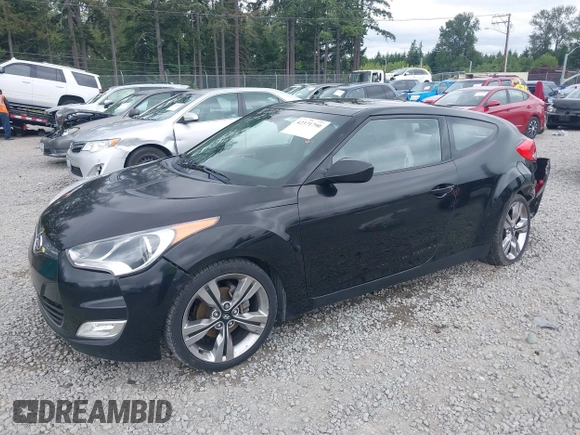 2012 Hyundai Veloster w/Gray Int with VIN KMHTC6AD4CU062034, listed as a IAAI auction lot 42371790 with 116,861 mi miles and . Bid and sale history available at DreamBid. Image 2.