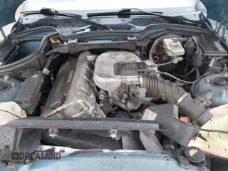 1997 BMW 3 Series 1.9L with VIN 4USCH7320VLB77355, listed as a IAAI auction lot 40758066 with 157,548 mi miles. Bid and sale history available at carsss.com. Image 10.