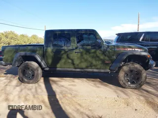 2021 Jeep Gladiator Mojave with VIN 1C6JJTEG8ML606876, listed as a IAAI auction lot 41632052 with 30,255 mi miles and . Bid and sale history available at DreamBid. Image 13.