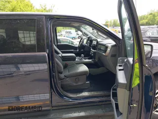 2023 Ford F-150 Lightning Pro with VIN 1FTVW1EL6PWG30061, listed as a IAAI auction lot 42362295 with 22,481 mi miles and . Bid and sale history available at DreamBid. Image 5.