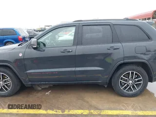 2018 Jeep Grand Cherokee Trailhawk with VIN 1C4RJFLG6JC320763, listed as a IAAI auction lot 41871683 with 115,417 mi miles and . Bid and sale history available at DreamBid. Image 14.