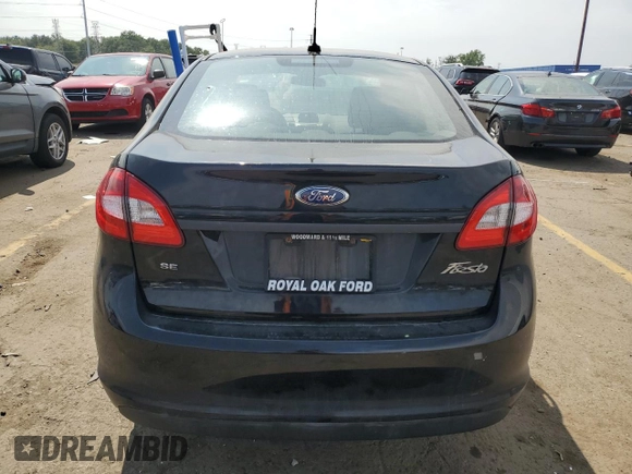 2012 Ford Fiesta SE with VIN 3FADP4BJ3CM118089, listed as a Copart auction lot 68630084 with 49,010 mi miles and Salvage Title. Bid and sale history available at DreamBid. Image 6.