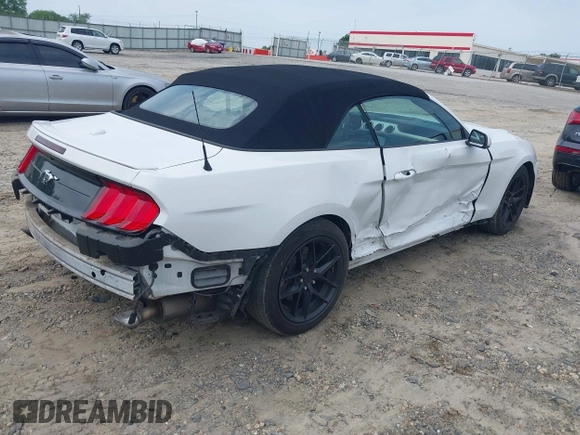 2020 Ford Mustang EcoBoost with VIN 1FATP8UH2L5119009, listed as a IAAI auction lot 42251261 with 80,725 mi miles and . Bid and sale history available at DreamBid. Image 4.