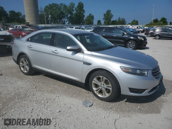 2015 Ford Taurus SEL with VIN 1FAHP2E80FG121013, listed as a Copart auction lot 59940235 with 209,632 mi miles and Clean title. Bid and sale history available at DreamBid. Image 4.