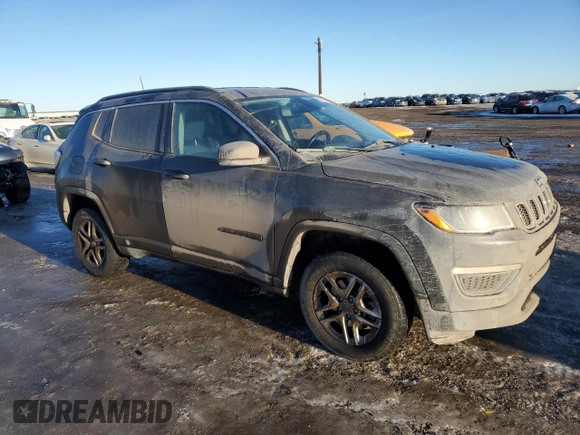 2020 Jeep Compass Sport with VIN 3C4NJDAB1LT112288, listed as a Copart auction lot 87818745 with 142,408 mi miles and Clean Title. Bid and sale history available at DreamBid. Image 4.