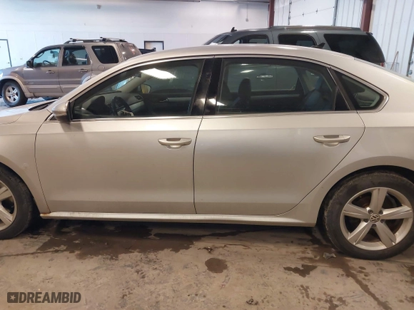 2012 Volkswagen Passat SE with VIN 1VWBH7A31CC035908, listed as a IAAI auction lot 41535111 with 119,816 mi miles. Bid and sale history available at carsss.com. Image 14.