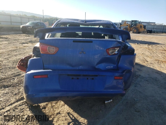 2009 Mitsubishi Lancer ES with VIN JA3AU26UX9U022011, listed as a Copart auction lot 74943964 with 129,312 mi miles and Salvage Title. Bid and sale history available at DreamBid. Image 6.