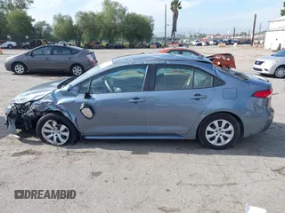 2023 Toyota Corolla LE with VIN JTDB4MEE7P3009635, listed as a IAAI auction lot 41808167 with 22,773 mi miles and . Bid and sale history available at DreamBid. Image 14.