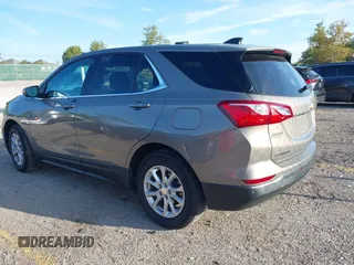 2018 Chevrolet Equinox LT z VIN 3GNAXJEV9JL115685, wystawiony jako IAAI lot #40373717 z przebiegiem 95 103 mil mil oraz . Historia ofert i sprzedaży dostępna na DreamBid. Obrazek 3.