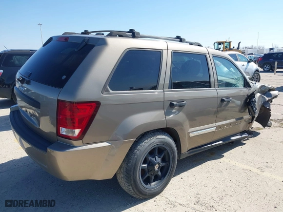 2005 Jeep Grand Cherokee Laredo with VIN 1J4HR48N35C647637, listed as a IAAI auction lot 38514345 with 167,342 mi miles. Bid and sale history available at carsss.com. Image 4.