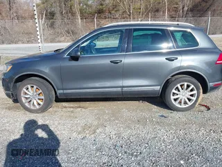 2016 Volkswagen Touareg Sport with VIN WVGEF9BP2GD005315, listed as a IAAI auction lot 41588590 with 134,709 mi miles and . Bid and sale history available at DreamBid. Image 14.