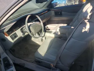 1993 Cadillac Eldorado z VIN 1G6EL12B1PU616913, wystawiony jako Copart lot #80311794 z przebiegiem 174 556 mil mil oraz Szkoda całkowita • Salvage title. Historia ofert i sprzedaży dostępna na DreamBid. Obrazek 7.