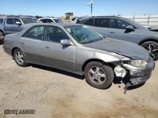 1998 Lexus ES 300 Luxury Sport Sdn with VIN JT8BF28G8W5026683, listed as a Copart auction lot 70980304 with 193,357 mi miles and Salvage Title. Bid and sale history available at carsss.com. Image 4.