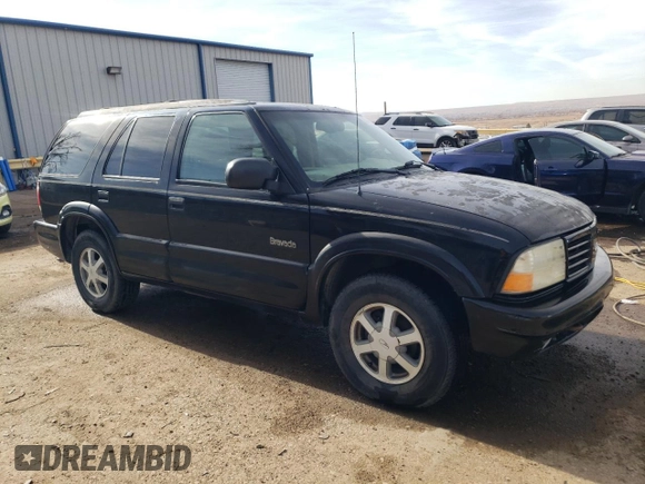 2000 Oldsmobile Bravada z VIN 1GHDT13W3Y2178106, wystawiony jako Copart lot #85069954 z przebiegiem 211 164 mil mil oraz Szkody całkowita. Historia ofert i sprzedaży dostępna na DreamBid. Obrazek 4.