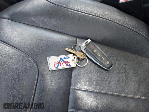 2013 Ford Escape Titanium with VIN 1FMCU0J9XDUD32178, listed as a IAAI auction lot 42754756 with 195,095 mi miles and . Bid and sale history available at DreamBid. Image 11.