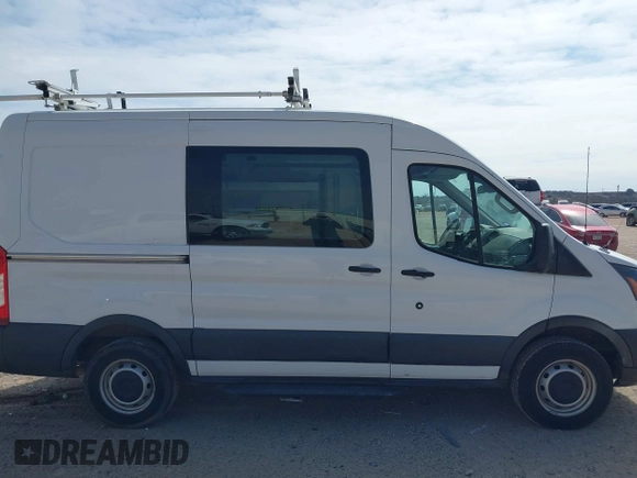 2016 Ford Transit Cargo with VIN 1FTYR1CMXGKA21918, listed as a IAAI auction lot 41528526 with 213,033 mi miles and . Bid and sale history available at DreamBid. Image 13.