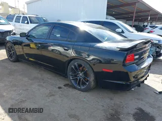 2013 Dodge Charger RT with VIN 2C3CDXCT2DH503048, listed as a IAAI auction lot 41856741 with 88,750 mi miles and . Bid and sale history available at carsss.com. Image 3.