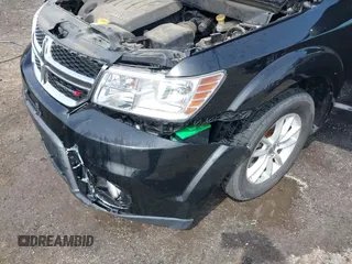 2014 Dodge Journey SXT with VIN 3C4PDCBG2ET262014, listed as a IAAI auction lot 41898343 with 199,732 mi miles. Bid and sale history available at carsss.com. Image 6.