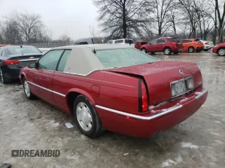 2001 Cadillac Eldorado ESC z VIN 1G6EL12Y61B107519, wystawiony jako Copart lot #38051744 z przebiegiem 52 018 mil mil oraz Czysty tytuł • Clean title. Historia ofert i sprzedaży dostępna na DreamBid. Obrazek 2.