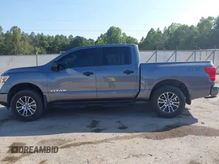 2023 Nissan Titan SV with VIN 1N6AA1EC6PN101712, listed as a IAAI auction lot 40206621 with 50,210 mi miles and . Bid and sale history available at DreamBid. Image 14.