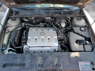 2002 Cadillac Seville Touring STS z VIN 1G6KY54922U243816, wystawiony jako Copart lot #79229134 z przebiegiem 52 832 mil mil oraz Szkoda całkowita • Salvage title. Historia ofert i sprzedaży dostępna na DreamBid. Obrazek 11.