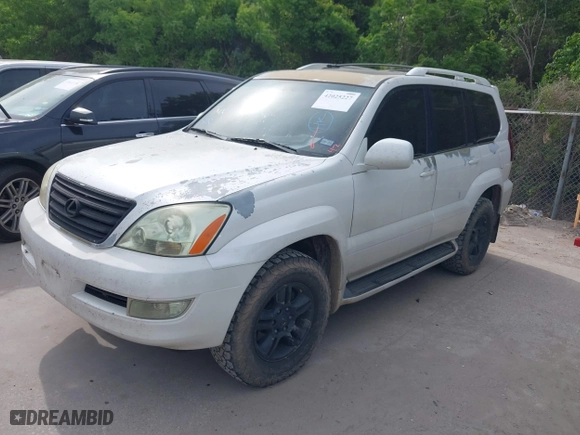 2007 Lexus GX 470 with VIN JTJBT20X570148905, listed as a IAAI auction lot 42025227 with 293,379 mi miles. Bid and sale history available at carsss.com. Image 21.
