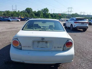 2003 Nissan Maxima GLE with VIN JN1DA31A03T421052, listed as a IAAI auction lot 42556685 with 240,183 mi miles and . Bid and sale history available at DreamBid. Image 17.