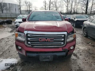 2018 GMC Canyon z VIN 1GTH6CEA3J1220524, wystawiony jako Copart lot #83235194 z przebiegiem 61 366 mil mil oraz Szkoda całkowita • Salvage title. Historia ofert i sprzedaży dostępna na DreamBid. Obrazek 5.