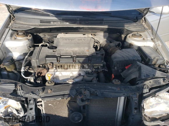 2009 Kia Spectra LX with VIN KNAFE221895659552, listed as a Copart auction lot 82555924 with 114,704 mi miles and Salvage Title. Bid and sale history available at carsss.com. Image 13.