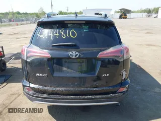 2018 Toyota RAV4 XLE with VIN 2T3WFREVXJW484872, listed as a IAAI auction lot 42144810 with Not provided miles and . Bid and sale history available at DreamBid. Image 17.