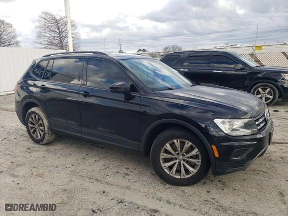 2018 Volkswagen Tiguan S with VIN 3VV1B7AXXJM105874, listed as a Copart auction lot 86565734 with 100,901 mi miles and Salvage Title. Bid and sale history available at carsss.com. Image 4.