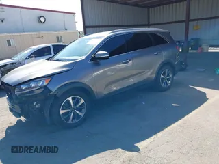 2019 Kia Sorento EX with VIN 5XYPHDA50KG514825, listed as a IAAI auction lot 41612310 with 100,855 mi miles and . Bid and sale history available at DreamBid. Image 2.