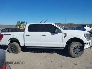 2023 Ford F-150 XL with VIN 1FTFW1E56PFC91467, listed as a IAAI auction lot 41030658 with 31,325 mi miles. Bid and sale history available at carsss.com. Image 14.