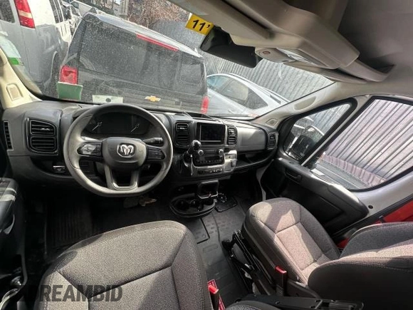 2023 Ram ProMaster Cargo with VIN 3C6MRVJG1PE585051, listed as a Copart auction lot 48306465 with 7,140 mi miles and Clean Title. Bid and sale history available at DreamBid. Image 9.