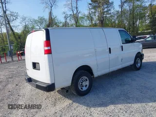 2021 Chevrolet Express Cargo Van with VIN 1GCWGAFP0M1206242, listed as a IAAI auction lot 42043866 with 148,087 mi miles. Bid and sale history available at carsss.com. Image 4.