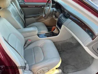 2002 Cadillac DeVille DTS with VIN 1G6KF57912U135771, listed as a Copart auction lot 82052554 with 56,268 mi miles and Clean Title. Bid and sale history available at carsss.com. Image 5.