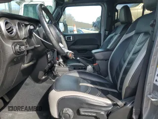 2018 Jeep Wrangler Unlimited Sahara z VIN 1C4HJXEG4JW285606, wystawiony jako Copart lot #49254405 z przebiegiem 57 148 mil mil oraz Szkoda całkowita • Salvage title. Historia ofert i sprzedaży dostępna na DreamBid. Obrazek 7.