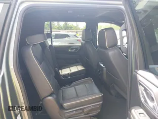 2023 Chevrolet Suburban Premier with VIN 1GNSCFKD6PR393843, listed as a IAAI auction lot 42101935 with 59,604 mi miles. Bid and sale history available at carsss.com. Image 8.