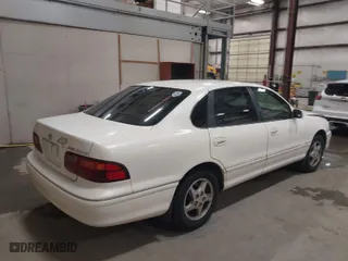 1999 Toyota Avalon XL with VIN 4T1BF18B2XU293904, listed as a IAAI auction lot 41645137 with NaN miles. Bid and sale history available at carsss.com. Image 4.