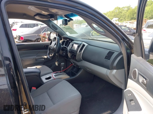 2013 Toyota Tacoma with VIN 3TMMU4FNXDM057020, listed as a IAAI auction lot 42560987 with 177,333 mi miles and . Bid and sale history available at DreamBid. Image 5.