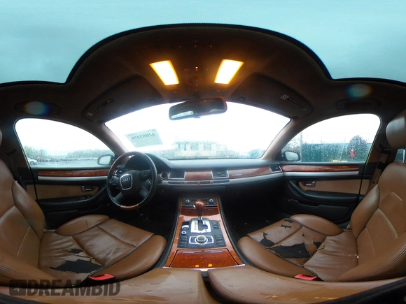 2006 Audi A8 z VIN WAUMR44E86N015925, wystawiony jako IAAI lot #42003490 z przebiegiem 175 003 mil mil oraz . Historia ofert i sprzedaży dostępna na DreamBid. Obrazek 18.