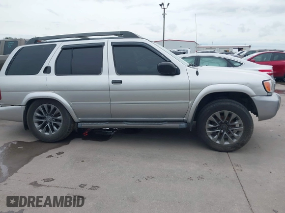 2003 Nissan Pathfinder LE z VIN JN8DR09Y03W800643, wystawiony jako IAAI lot #42373234 z przebiegiem 214 389 mil mil oraz . Historia ofert i sprzedaży dostępna na DreamBid. Obrazek 13.
