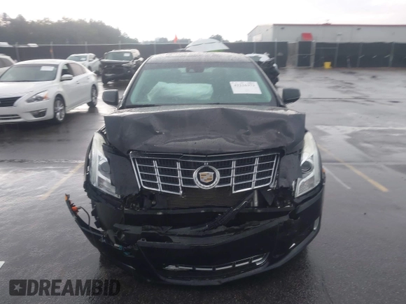 2013 Cadillac XTS Premium z VIN 2G61S5S39D9112491, wystawiony jako IAAI lot #42216373 z przebiegiem 145 338 mil mil oraz . Historia ofert i sprzedaży dostępna na DreamBid. Obrazek 12.