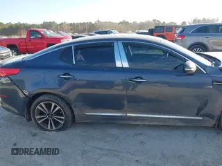 2015 Kia Optima EX with VIN 5XXGN4A71FG426726, listed as a IAAI auction lot 41341272 with 114,298 mi miles. Bid and sale history available at carsss.com. Image 13.