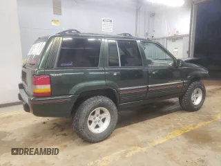 1995 Jeep Grand Cherokee Limited with VIN 1J4GZ78S7SC766726, listed as a Copart auction lot 84909134 with 174,256 mi miles and Salvage Title. Bid and sale history available at carsss.com. Image 3.
