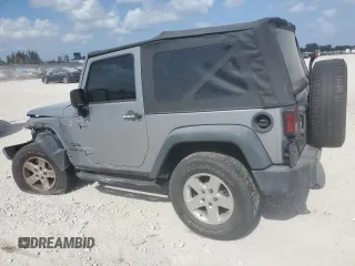2015 Jeep Wrangler Sport with VIN 1C4AJWAG1FL745444, listed as a Copart auction lot 54062935 with 175,998 mi miles and Salvage Title. Bid and sale history available at carsss.com. Image 2.